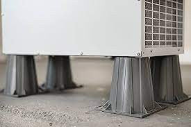 Crawl Space Ninja Supply AprilAire dehumidifier installed on 6-inch risers for elevated crawl space drainage